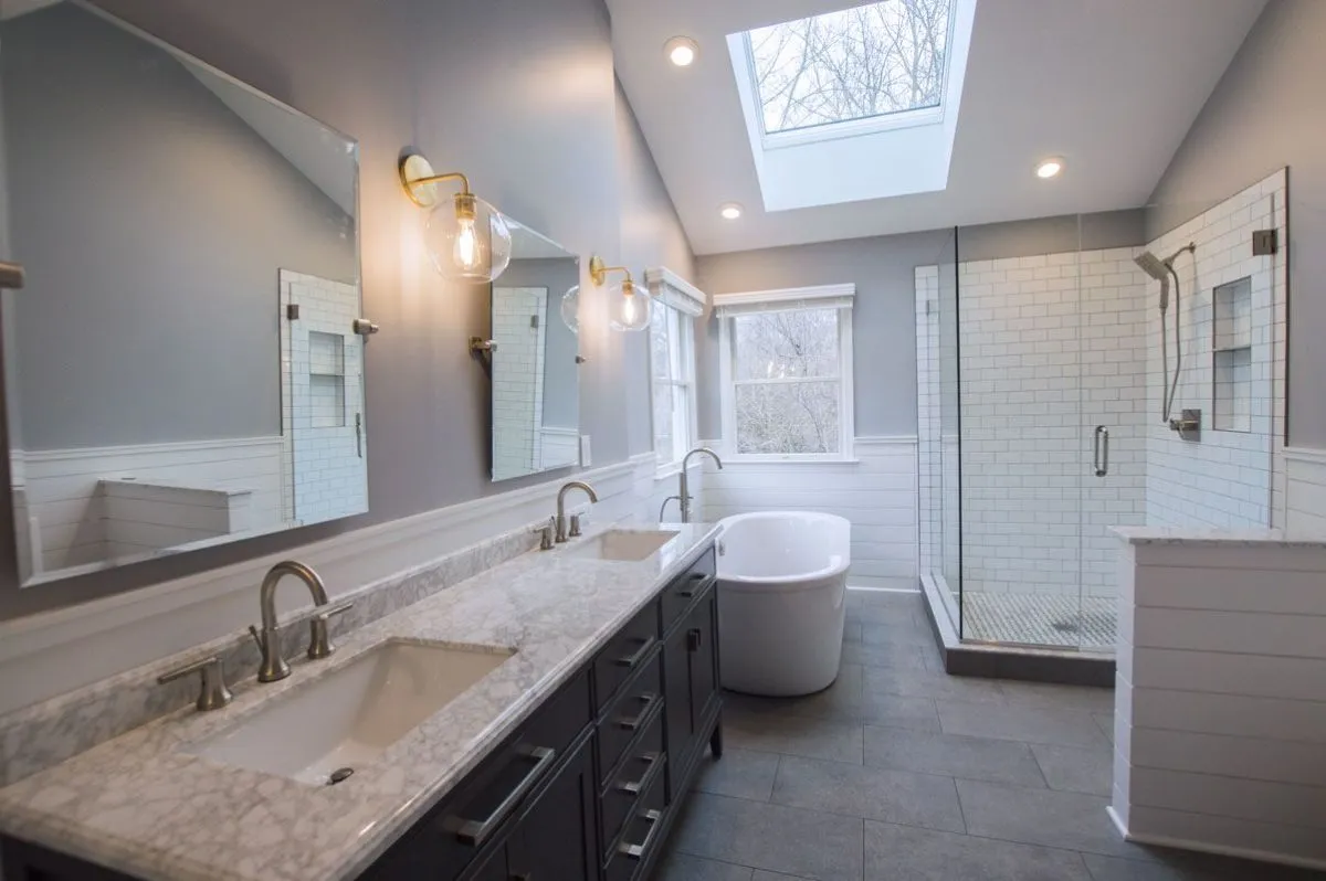 Fairfield County bathroom renovation with charcoal double vanity and subway tile glass shower