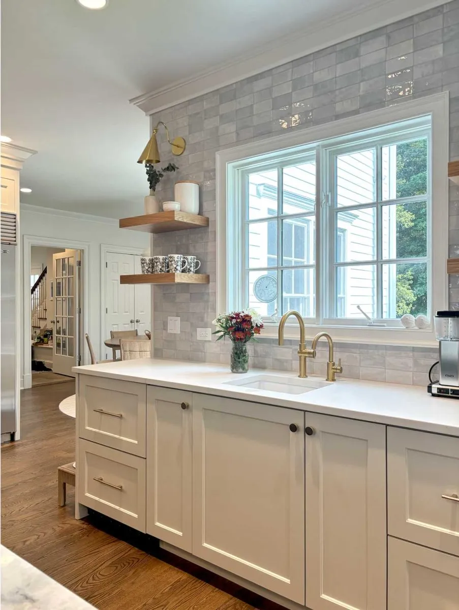 Kitchen remodel with brass fixtures and tile backsplash in Fairfield County, CT